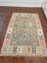Vintage pastel wool rug